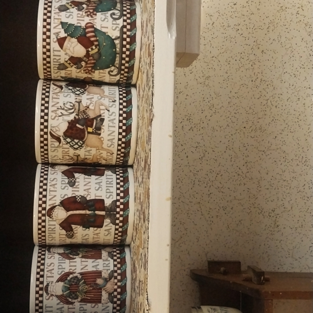 4 Christmas themed coffee mugs